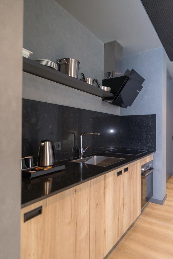 Mk Hotel Tirana Rinas Luaran gambar A kitchen in a serviced apartment in Paris