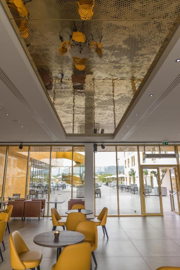 Mk Hotel Tirana Rinas Luaran gambar The ceiling of the lobby