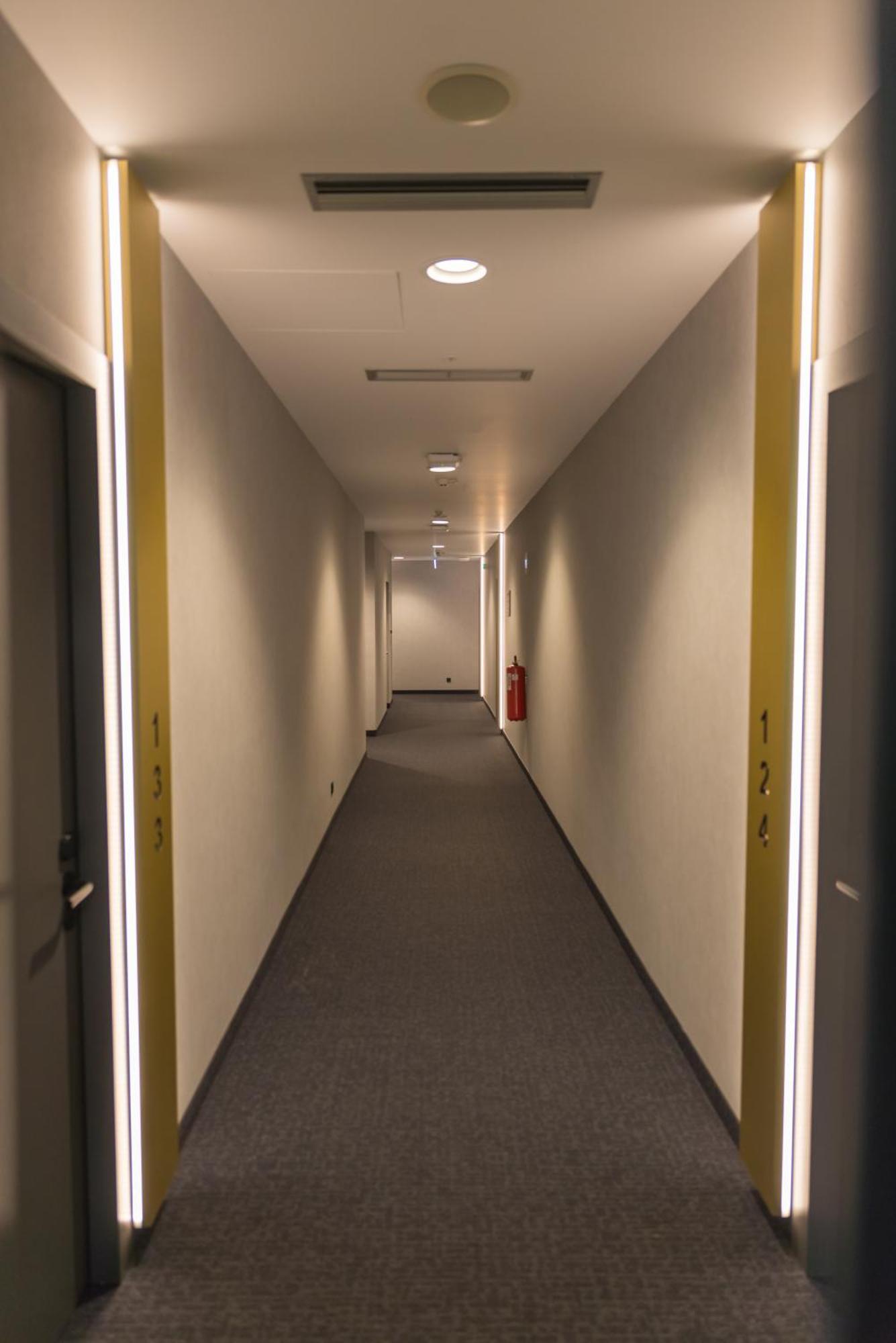 Mk Hotel Tirana Rinas Luaran gambar A corridor in the new building